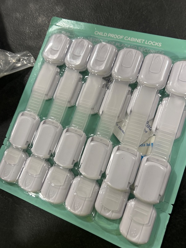 Photo 1 of Baby Proofing Child Safety Locks (12 Pack) by Skyla Homes - The Safest, Quickest and Easiest 3M Adhesive Cabinet Latches, No Screws & Magnets, Multi-Purpose for Furniture, Kitchen, Ovens, Toilet Seats