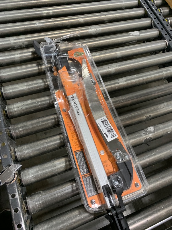 Photo 1 of Fiskars 2-in-1 Extendable Tree Pruner and Pole Saw (Extends 7.9 - 12 feet) with Rotating Head, Pruning Stik Model with15-Inch Double-Grind Saw Blade, and Double Locking System