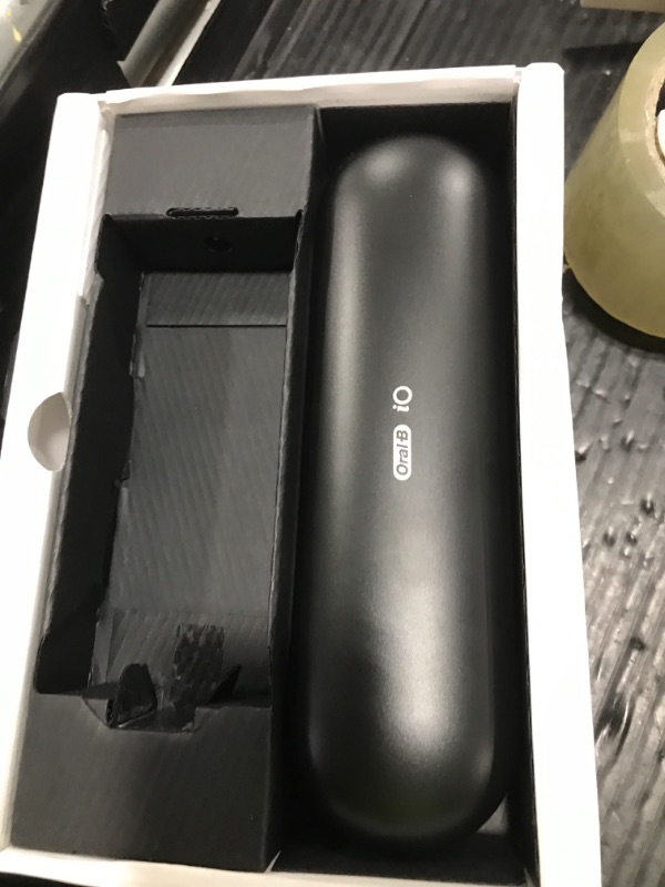 Photo 1 of Oral-B iO Series 10 Rechargeable Electric Toothbrush with Visible Pressure Sensor to Protect Gums, 2 Min Timer, 7 Cleaning Settings, 4 Replacement Toothbrush Heads, and Charging Travel Case, Black
