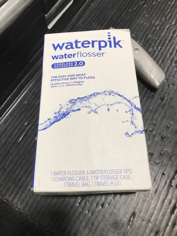 Photo 1 of Waterpik Cordless Advanced 2.0 Water Flosser For Teeth, Gums, Braces, Dental Care With Travel Bag and 4 Tips, ADA Accepted, Rechargeable, Portable, and Waterproof, Blue WP-583, Packaging May Vary