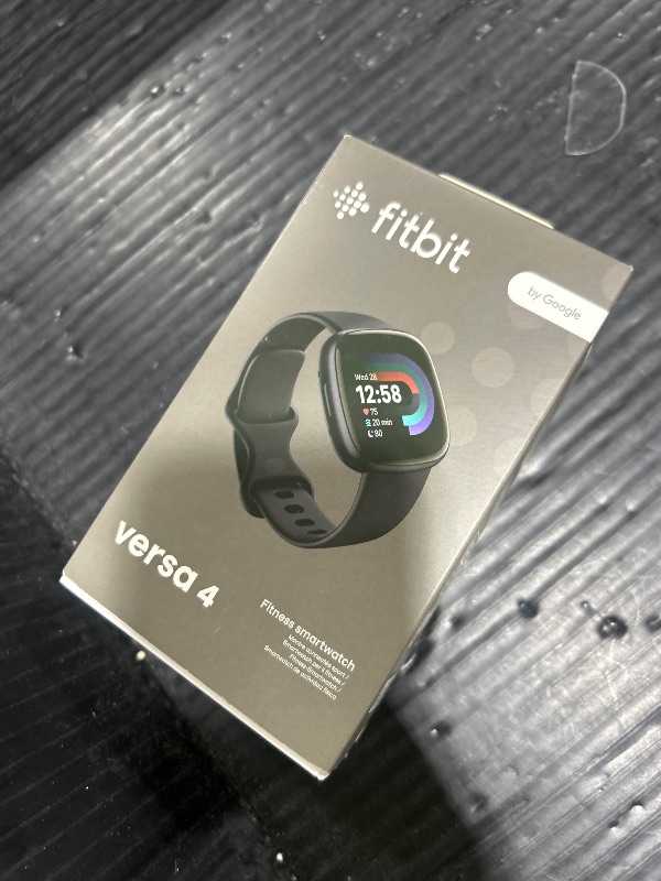 Photo 1 of Fitbit Versa 4 Fitness Smartwatch with Daily Readiness, GPS, 24/7 Heart Rate, 40+ Exercise Modes, Sleep Tracking and more, Black/Graphite, One Size (S & L Bands Included)