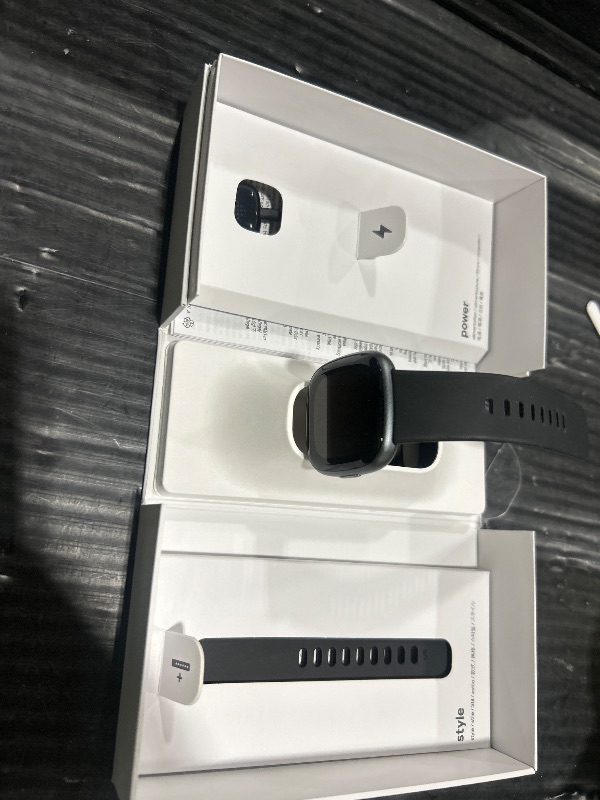 Photo 1 of Fitbit Versa 4 Fitness Smartwatch with Daily Readiness, GPS, 24/7 Heart Rate, 40+ Exercise Modes, Sleep Tracking and more, Black/Graphite, One Size (S & L Bands Included)
