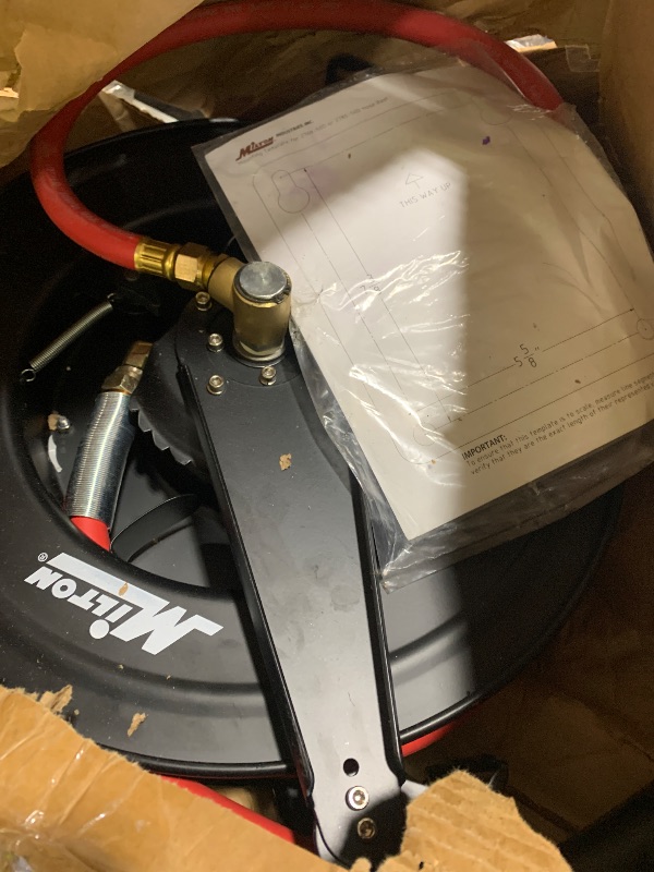 Photo 1 of Milton 2780-50D - Steel Dual Arm Auto-Retractable Air Hose Reel, 1/2" x 50 ft. Rubber Hose - 300 Max PSI