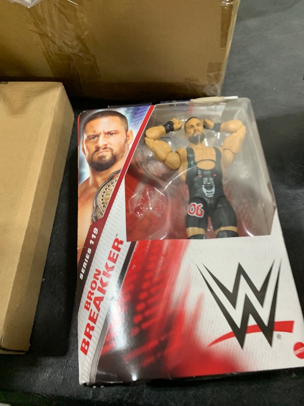 Photo 1 of Mattel WWE Elite Action Figure & Accessories, Series #119, 6-inch Collectible Bron Breaker with 25 Articulation Points & Swappable Hands