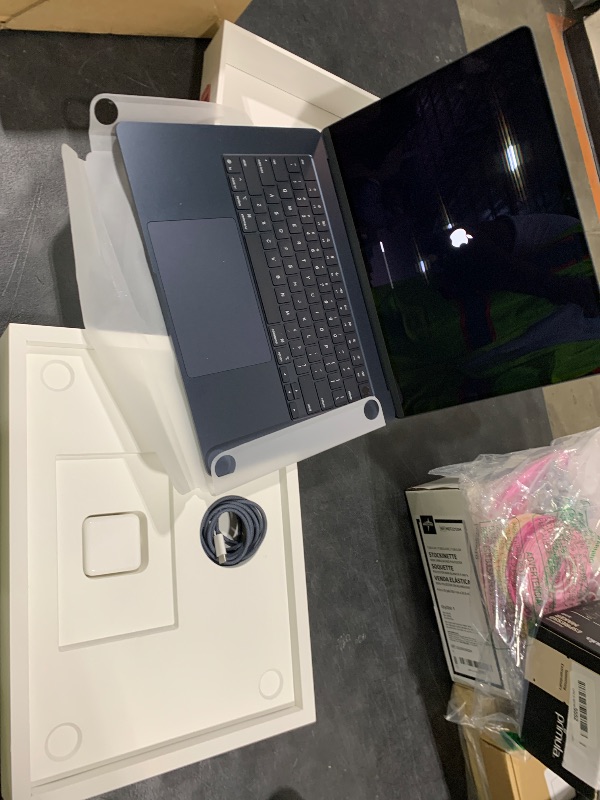 Photo 1 of Apple 2025 MacBook Air 15-inch Laptop with M4 chip: Built for Apple Intelligence, 15.3-inch Liquid Retina Display, 16GB Unified Memory, 256GB SSD Storage, 12MP Center Stage Camera, Touch ID; Midnight