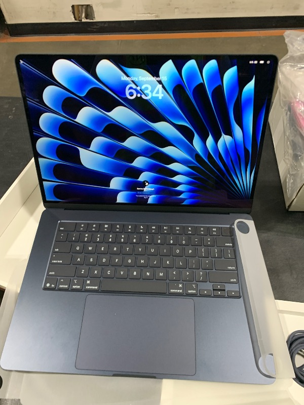 Photo 1 of Apple 2025 MacBook Air 15-inch Laptop with M4 chip: Built for Apple Intelligence, 15.3-inch Liquid Retina Display, 16GB Unified Memory, 256GB SSD Storage, 12MP Center Stage Camera, Touch ID; Midnight
