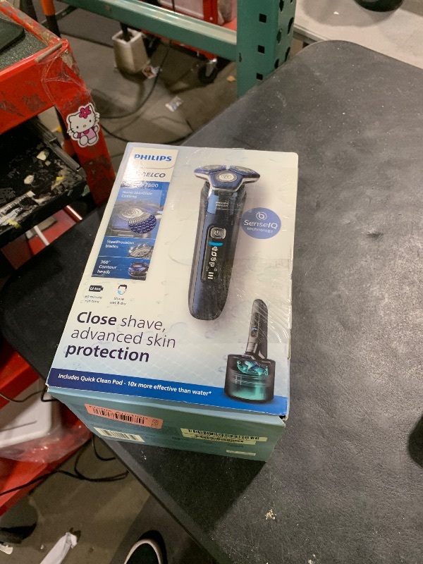 Photo 1 of Philips Norelco Shaver 7800, Rechargeable Wet & Dry Electric Shaver with SenseIQ Technology, Quick Clean Pod, Charging Stand, Travel Case and Pop-up Trimmer, S7885/85