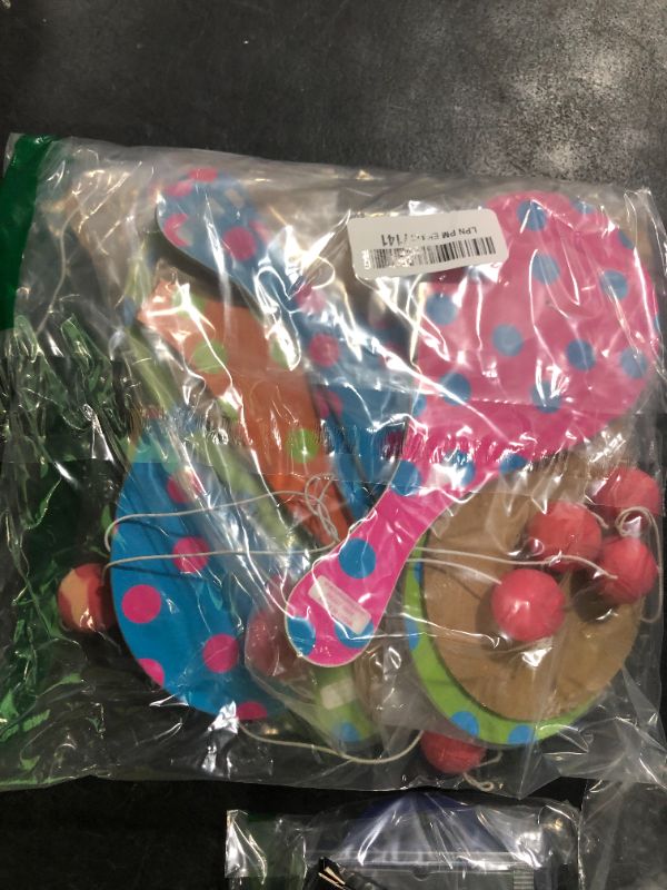 Photo 1 of Fun Express 9" Spring Paddleball Games with Bright Colors & Patterns - Easter Paddleball Set - Bulk Spring Toys and Gifts - 12 Pieces