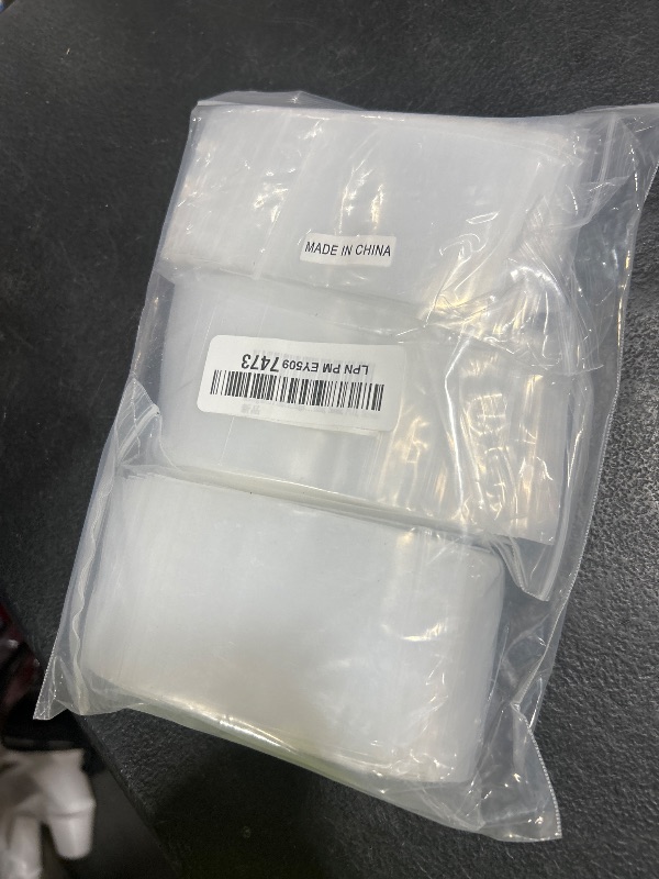 Photo 1 of newlng 300pcs Mini Heavy Duty Plastic Bags 2.4x3.5"/6x9cm Jewelry Bags Resealable Clear Poly Bag 6.3mil/(Thicken) Small Zip Bag for Jewelry, Candy, Snacks, Bead, Coins, Seeds, Pill, Screws