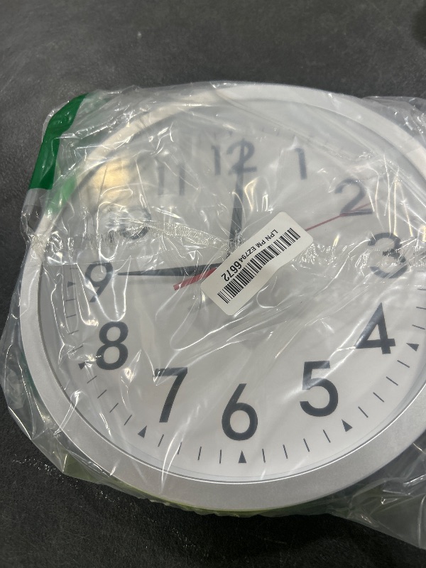 Photo 1 of DAXSMY Wall Clock Modern Battery Operated 10 Inch Simpel Silent Non Ticking Decorative for Kitchen Office Outdoor Bedroom Living Room School Classroom(Silver)