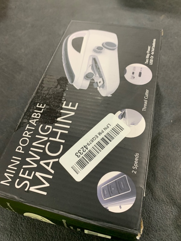 Photo 1 of Handheld sewing machine,easy to use, electric sewing machine?fast sewing speed, Easy sewing of clothes and fabrics?White?