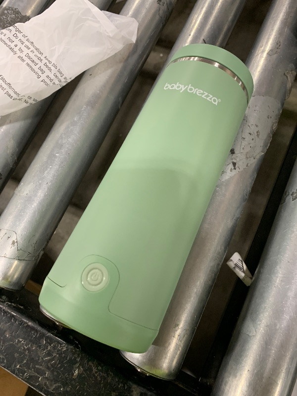 Photo 1 of Baby Brezza SuperFast Portable Baby Bottle Warmer – 67% Faster - Travel Breastmilk Warmer and Formula Warmer - Safe, Even Heating - Up to 9oz - No Adapters, Green