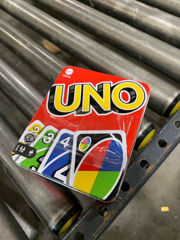 Photo 1 of Mattel Games UNO Card Game in a Collectible Storage Tin for Kids, Adults, Families, Parties & Travel, 2 to 10 Players (Amazon Exclusive) (Amazon Exclusive)