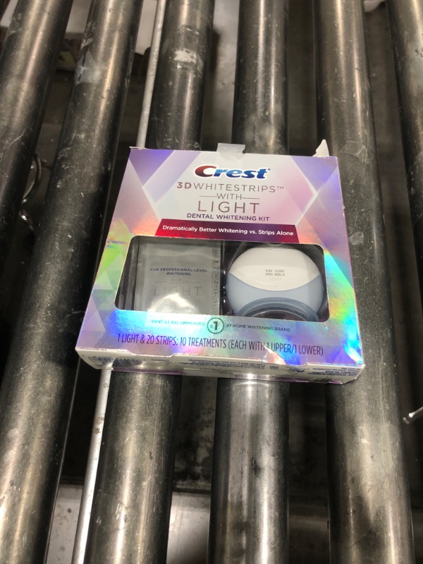 Photo 1 of Crest 3D Whitestrips + LED Light – Teeth Whitening Kit, 1 Light + 10 Treatments, Each with 1 Upper/1Lower, 20 Strips – Crest 3DWhite Teeth Whitening Strips
