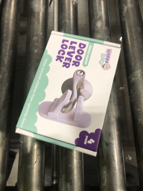 Photo 1 of Door Lever Locks (4 Pack) - Prevents Toddlers from Opening Doors - Durable ABS with 3M Adhesive - Easy One-Hand Operation for Adults, No Tools Needed