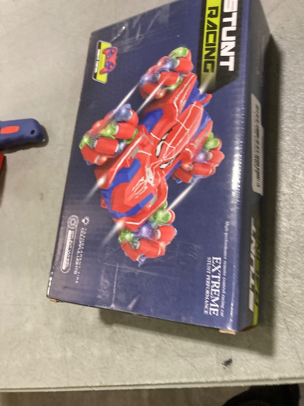 View 2 of Punieayi Spider Remote Control Car, 2.4Ghz RC Cars with Headlight Double Sided Off-Road 360° Rotating Rechargeable 4WD RC Stunt Car Indoor Outdoor Spider Toys for Boys 4-6 5-7 8-13