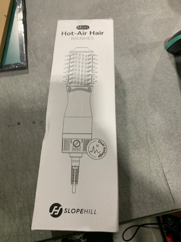 Photo 1 of slopehill Mini Dual Voltage Hair Dryer Brush,1000 Watts Travel Hot Air Brush with European Plug, Ionic One Step Hair Dryer and Styler for Women for Home & Salon, Oval Barrel 2 Heat & 2 Speed Settings