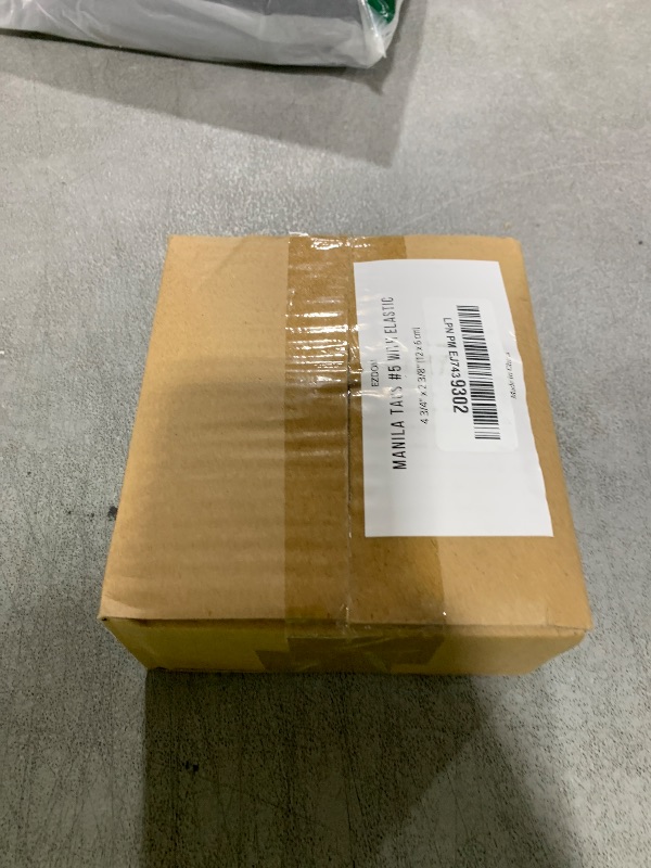 Photo 1 of Tags with Elastic String Attached - #5, 4 3/4" x 2 3/8" Box of 200 Manila Paper Label Tags with Elastic Loop and Reinforced Hole