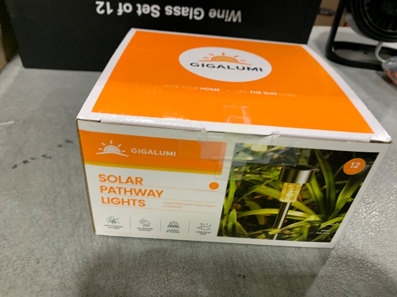 Photo 1 of GIGALUMI Solar Lights Outdoor Waterproof, 12 Pack, Stainless Steel LED Solar Garden Lights for Patio, Lawn, Yard and Landscape, Garden Decor Patio Decor,Warm White