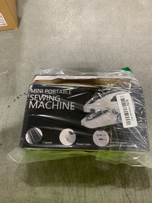 Photo 1 of Handheld Sewing Machine103