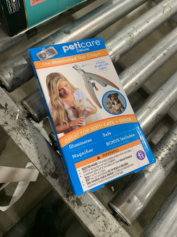 Photo 1 of Allstar Innovations PetiCare LED Light Pet Nail Clipper- Great for Trimming Cats & Dogs Nails & Claws, 5X Magnification That Doubles as a Nail Trapper, Quick-Clip, Steel Blades
