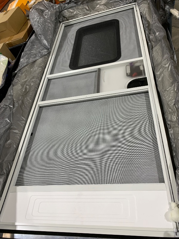 Photo 1 of Lippert Components Right Hinge RV Entry Door with Screen Door, 30" x 72", Square, Felt Seal - V000149585,Polar White