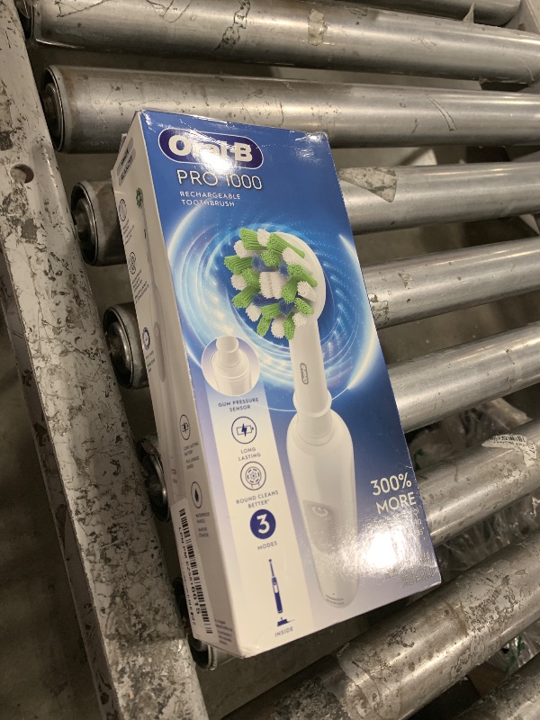 Photo 1 of Oral-B Pro 1000 Rechargeable Electric Toothbrush, White