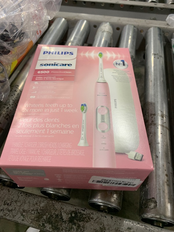 Photo 1 of Philips Sonicare ProtectiveClean 6500 Rechargeable Electric Toothbrush, with Pressure Sensor, 3 Cleaning Modes, SmarTimer and QuadPacer, 14-Day Battery Life, Charging Travel Case, Pink, HX6462/06