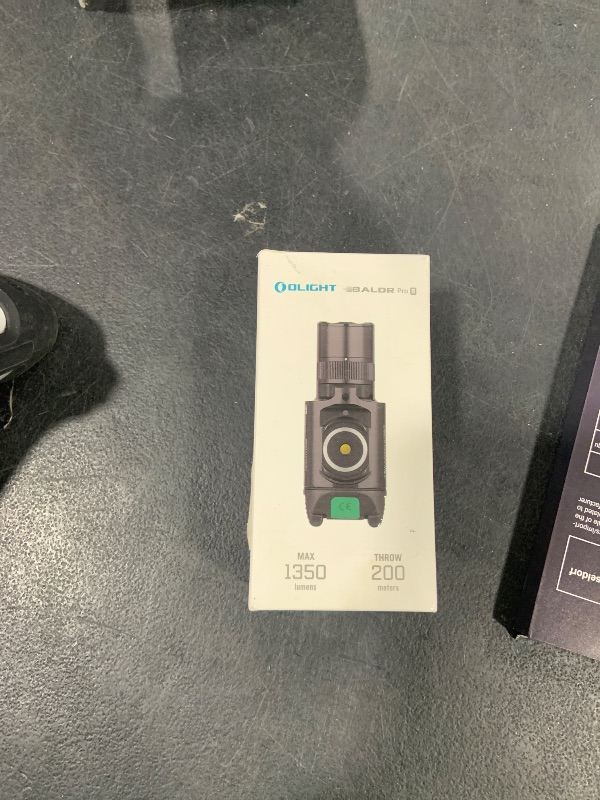 Photo 1 of OLIGHT Baldr Pro R 1350 Lumens Magnetic USB Rechargeable Tactical Flashlight with Green Beam and White LED Combo, Rail Mount Weaponlight Compatible with 1913 or GL Rail, Built-in Battery