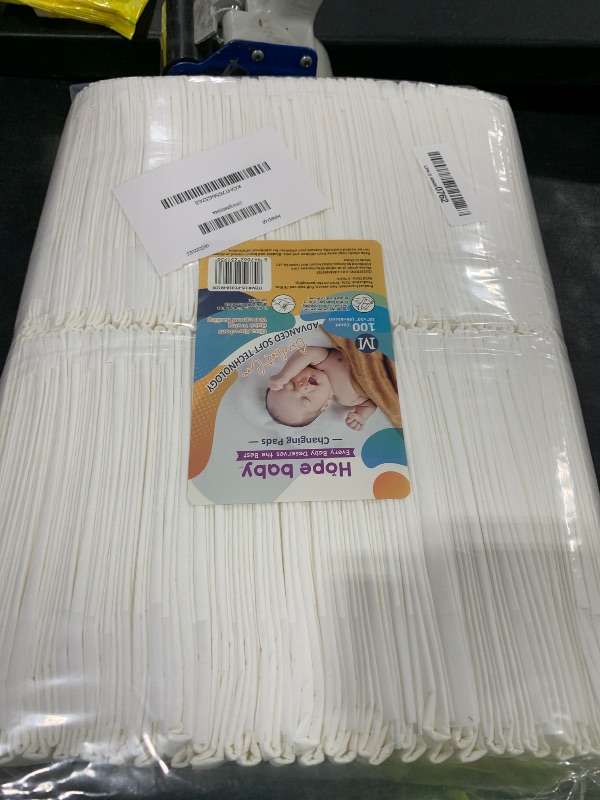 Photo 1 of JUS COOL Baby Disposable Changing Pads, 18”x 24”(100 Count) Underpads Portable Diaper Changing Pads, Soft Bed Pads Ultra Absorbent and Waterproof