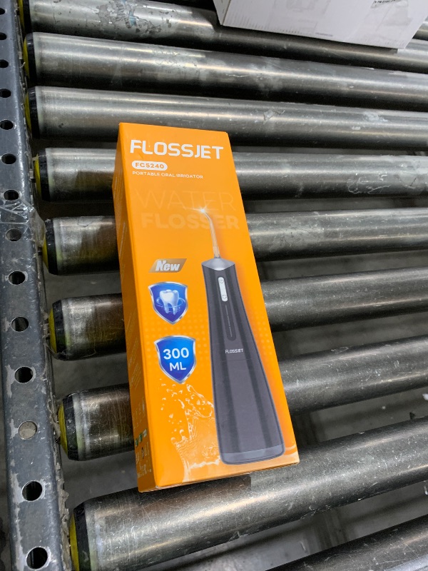 Photo 1 of FlossJet Water Dental Flosser Cordless Oral Irrigator with 300ml 5 Tips 