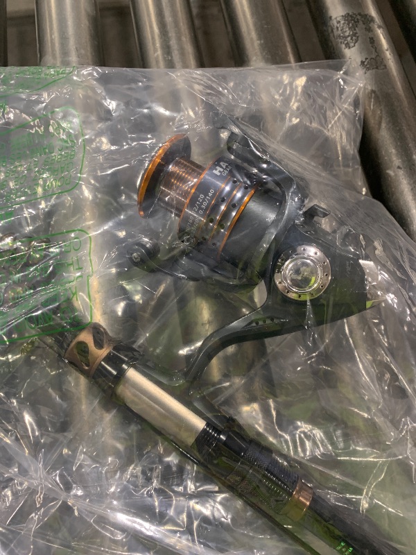 Photo 1 of PLUSINNO Fishing Rod and Reel Combos - Carbon Fiber Telescopic Fishing Pole - Spinning Reel 12 +1 Shielded Bearings Stainless Steel 