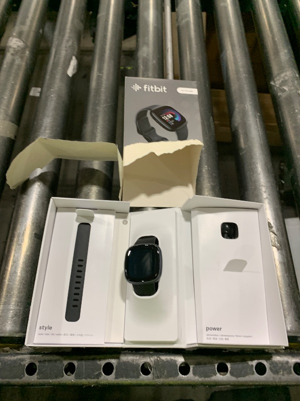 Photo 1 of Fitbit Versa 4 Fitness Smartwatch with Daily Readiness, GPS, 24/7 Heart Rate, 40+ Exercise Modes, Sleep Tracking and more, Black/Graphite, One Size (S & L Bands Included)