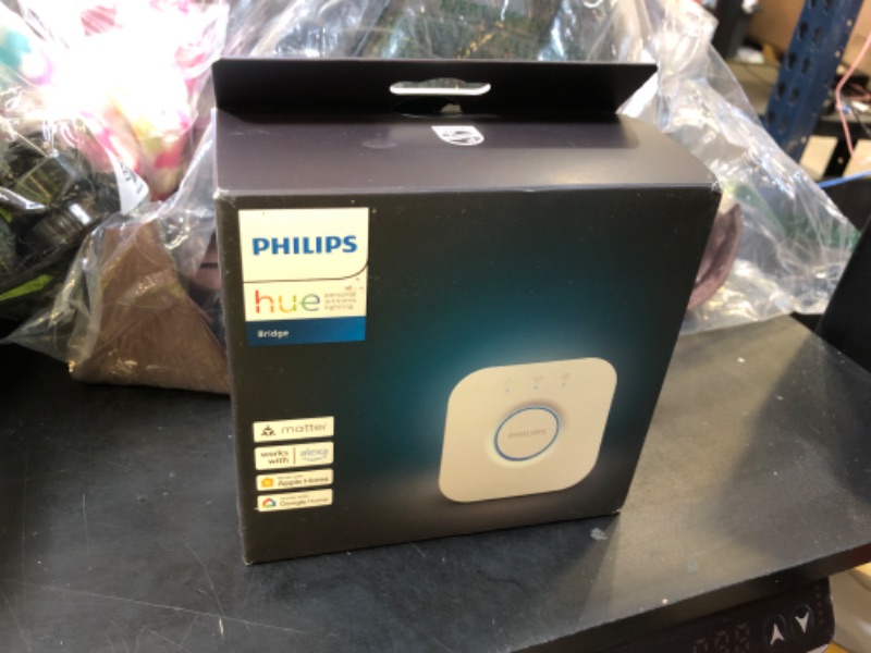 Photo 1 of Philips Hue Bridge - Unlock the Full Potential of Hue - Multi-Room and Out-of-Home Control - Create Automations and Zones - Secure, Stable Connection Won't Strain Your Wi-Fi - Works with Voice, Matter