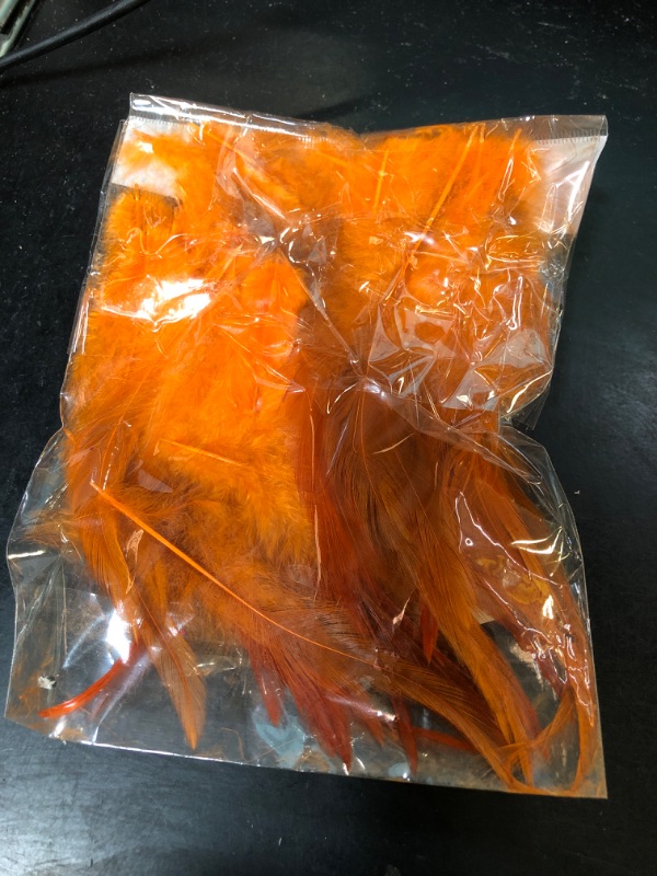 Photo 1 of  Orange Feathers for Crafts, 5-7Inch Rooster Saddle Hackle Feathers for Crafting Earrings Dream Catchers Dress Hats Decor Wedding Home Party Decoration