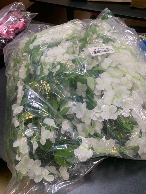 Photo 1 of WEISPARK Wisteria Hanging Flowers - 36 Pieces 3.75 Feet/Piece Artificial Wisteria Vine Fake Ratta Hanging Garland Silk Flowers for Home Party Wedding Decor