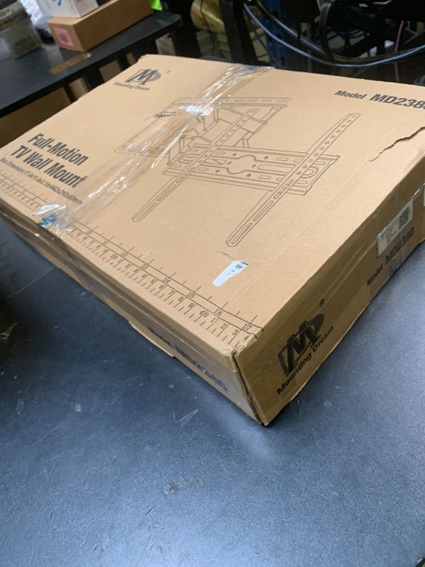 Photo 1 of Mounting Dream TV Wall Mount for 32-65 Inch Television,Mount with Swivel and Tilt, Full Motion Bracket with Articulating Dual Arms, Fits 16inch Studs, Max VESA 400X400 mm, 99lbs, MD2380