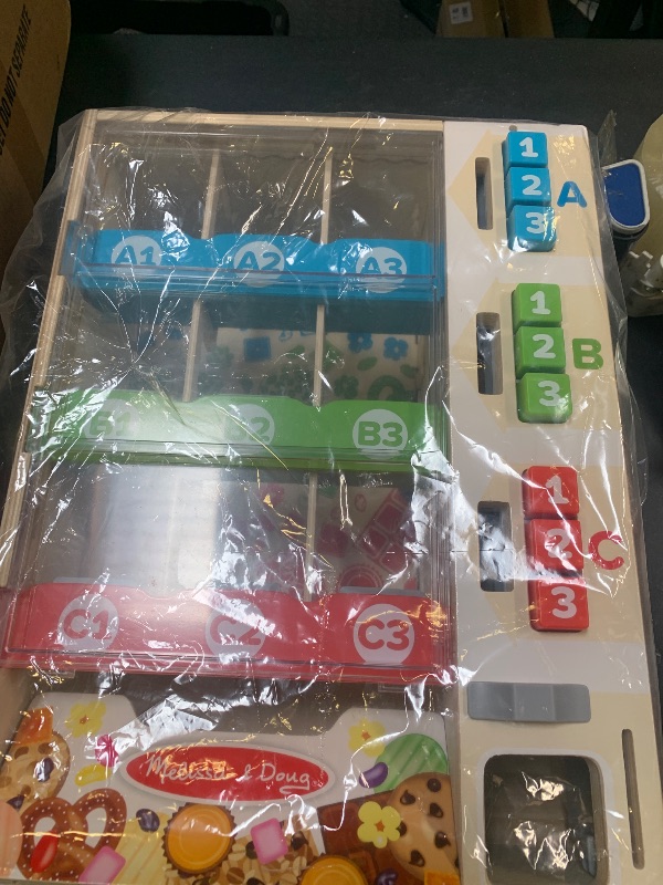 Photo 1 of Melissa & Doug Sort, Stock, Select Wooden Vending Machine Play Set, Wooden Toy Play Food for Boys and for Girls 3+