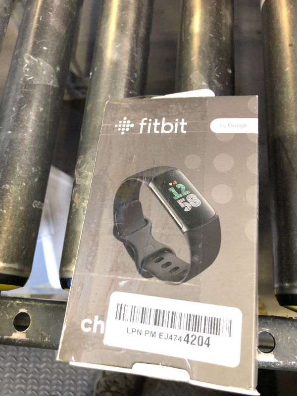 Photo 1 of Fitbit Charge 6 Fitness Tracker with Google apps, Heart Rate on Exercise Equipment, 6-Months Premium Membership Included, GPS, Health Tools and More, Obsidian/Black, One Size (S & L Bands Included)