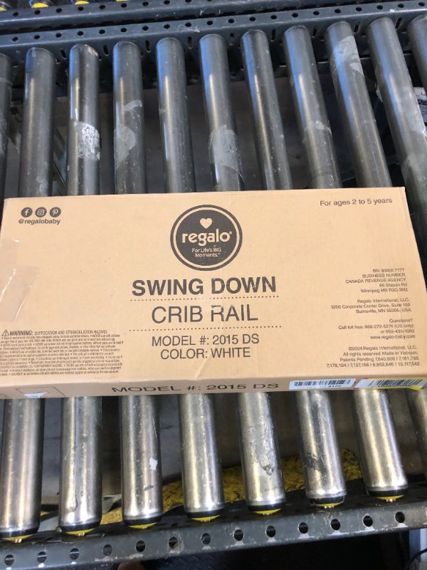 Photo 1 of Regalo Swing Down Crib Rail, with Reinforced Anchor Safety System