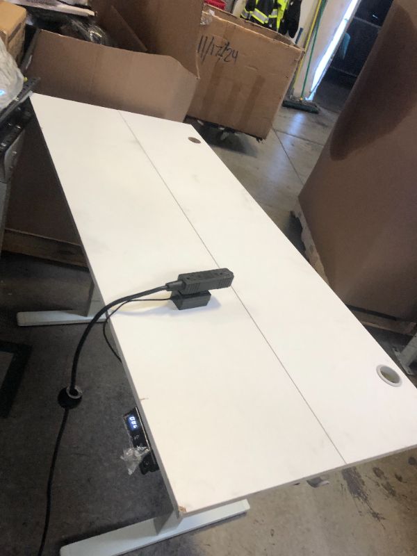 Photo 1 of Height Adjustable Desk 24x55x32inch. (NO BOX)