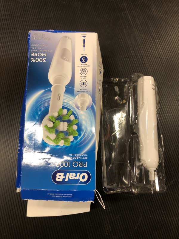 Photo 1 of Oral-B Pro 1000 Rechargeable Electric Toothbrush, White