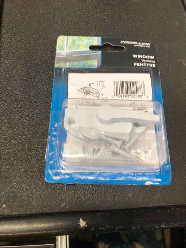 Photo 1 of Prime-Line F 2588 Sash Lock, 2-1/16 In. Hole Centers, Fits Single and Double Hung vinyl Windows, Diecast, White, (Single Pack)