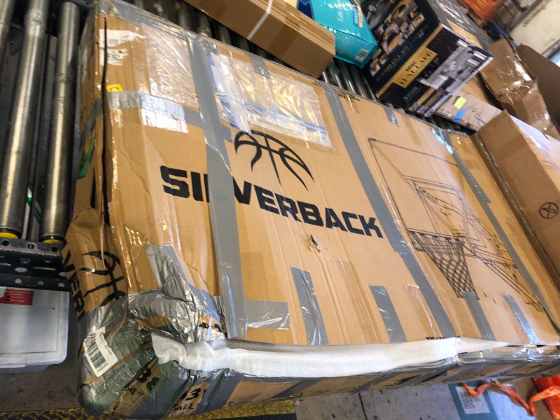 Photo 1 of Silverback NXT 54" Wall Mounted Adjustable-Height Basketball Hoop with QuickPlay Design