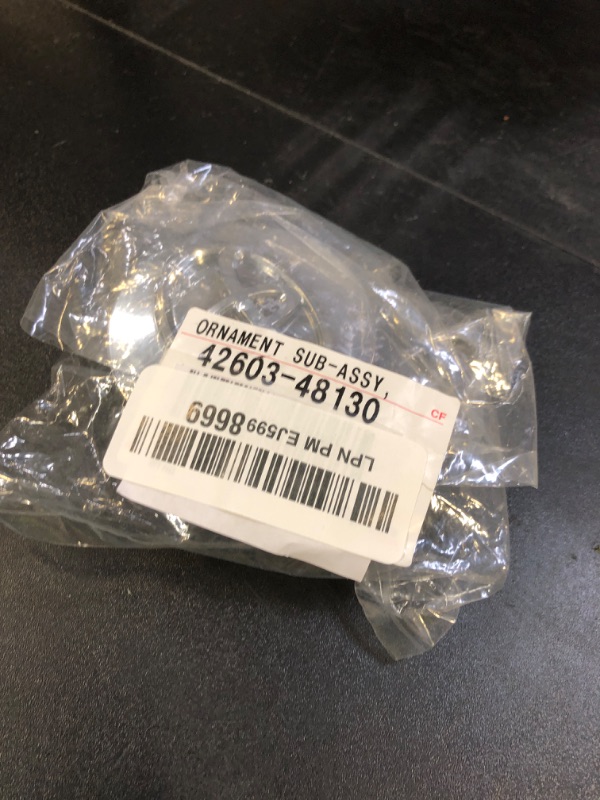 Photo 1 of Toyota Genuine Parts 42603-48130 Center Wheel Cap