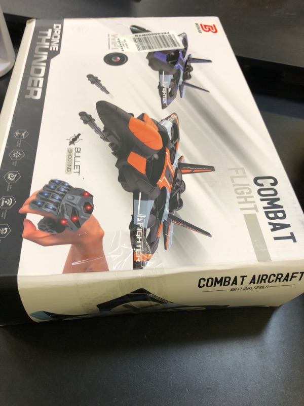 Photo 1 of BEZGAR RC Plane for Kids | 2.4GHZ Brushless Drones with Camera, 6-axis Gyro Remote Control Airplane, 360° Flip Fighter Jet Toy, Toys for Ages 8+ with Colorful LED Navigation Lights Orange