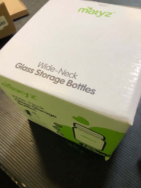 Photo 1 of Matyz Glass Breastmilk Storage Containers, 4 Pack, 6 oz Bottle, Fit with Spectra Medela Avent Pump - Wide Mouth Breastmilk Collection and Storage Bottle with Lids - No BPA (2 Green & 2 Blue Lids)