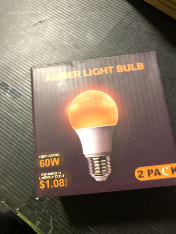 Photo 1 of DALUXshop Amber Sleep Light Bulbs, Blue Light Blocking, A19 9W(60 Watt Equivalent) Dim Light Bulbs for Lamp, 1800K Warm Light Bulb, E26 for Healthy Sleep, Bedroom, Kids Room, 2 Pack
