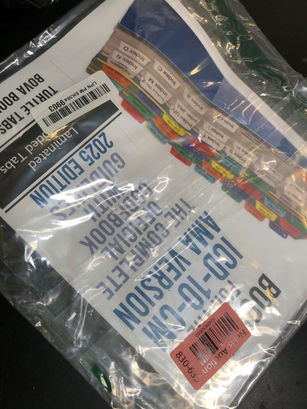 Photo 1 of Book Tabs for ICD-10-CM 2025 The Complete Official Codebook with Guidelines (AMA/Optum Physicians Version). Laminated, Color-Coded, and Repositionable with Alignment Card. (Book not Included)