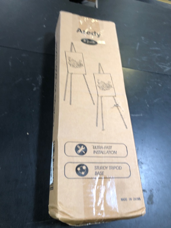 Photo 1 of Easel Stand for Sign, Aredy 63" Portable Painting Easel, Lightweight Metal Easels for Painting Canvas, Wedding Sign (2 Pack)